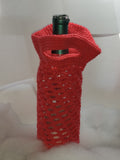 Christmas colored crocheted wine cozies