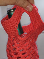 Christmas colored crocheted wine cozies