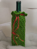 Christmas colored crocheted wine cozies